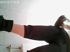 Asian woman squats and takes a piss