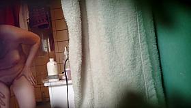 Chubby asian girl spied in bathroom