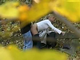 Very attractive blonde sucking dick and getting fucked doggystyle in the woods while being secretly videotaped