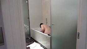 Sneaky peek of wife getting into bath