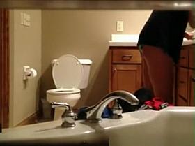 Milf caught in bathroom hidd cam