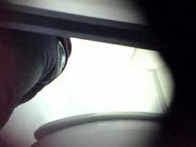 Two hot ladies pissing before a spy cam