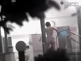 Asian woman pouring nude body with water before the pool