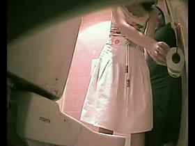 Slim girl in thong pissing was shot on the spy cam