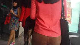 SEXY LADY WALKING IN THE CITY