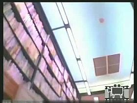 Sweet brunette shows her ass in upskirt voyeur video