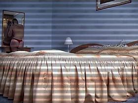 Uninhibited blonde takes her clothes off and goes to bed in