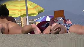 Great looking nudist chicks with big tits spreading their le