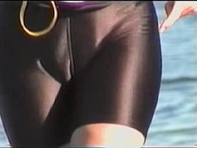 Candid cameltoe closeup of girl in the latex shorts 04n