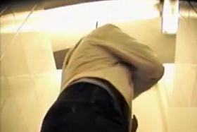 Hidden camera urinating in a public WC