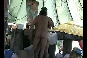 A naked blonde and a golden haired beauty in a beach porno vid