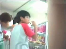 Cute asian babe in string panty up the dress