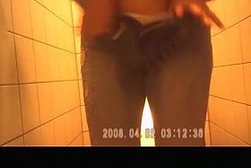 Woman with short hair pissing