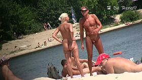 Flat chested brunette and mature blonde on beach voyeur vid