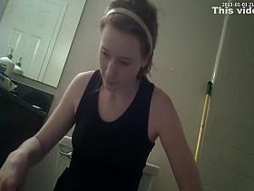 Ginger girl is spied while taking a piss