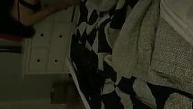 Wife putting on stockings