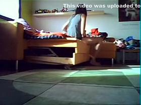 Young roommate deciding what to wear