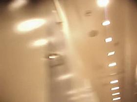 Sweetie in changing room takes off her skirt showing panty