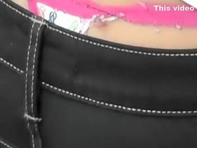Charming teen girl's thong peeks out