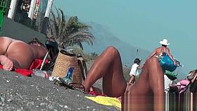 Real amateur nudist hotties with naked pussy at the beach