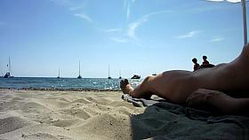 Real exhibitionist strokes his horny dick on a public beach