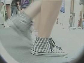 Candid upskirt voyeur loves gaping butts.