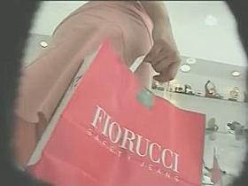 Outside of store a fit brunette upskirt with a pronounced ass