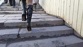 Black leather boots and tan stockings upskirt