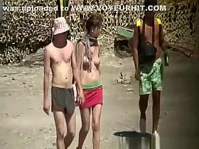 Topless girl caught by voyeur