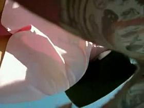 Fit girl upskirt voyeur video in the public street