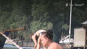 Fat amateur sits on beach voyeur cam with huge naked boobs