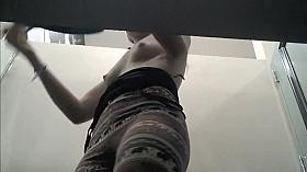 Curvy girl in the dressing cabin