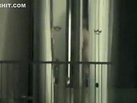 Peeping through hotel bedroom window