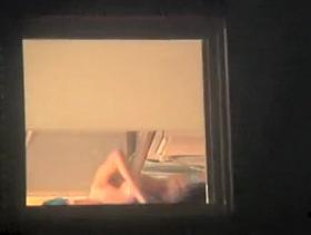 Nude girl spied from the window