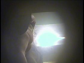 Gal is slowly stripping in the hot changing room spy cam vid