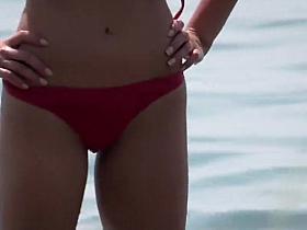 Beautiful beach girl is fully inspected