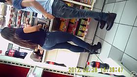 Tight jeans make for a fine Brazilian booty at the store