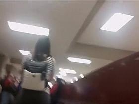 Schoolgirl's big butt in tights