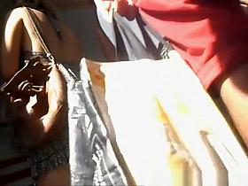 Girl in short colorful dress upskirt