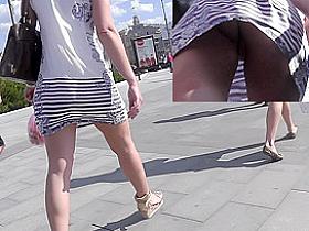 Adorable lady in mini skirt got in public upskirt scene