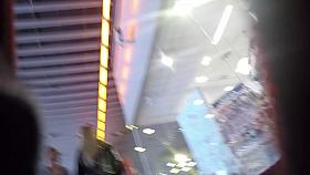 White dress, white string. Blonde gal.