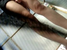 The leggy girl showed quick flash on voyeur beach cam