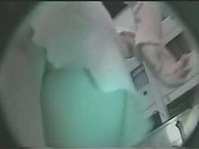 Brunette sweetie in a white dress shows ups her upskirt thong