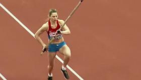 Pole vaulter with a nice butt competes in an event