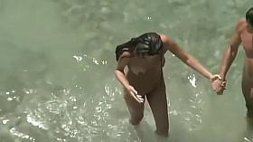 Naked Couple Enjoy A Day At The Beach