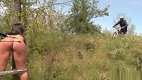 Huge ass brunette spanked in woods