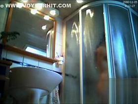 My young wife takes a shower and dries off