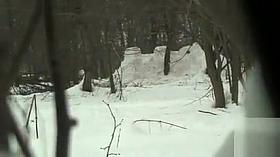 Russian maid gets caught peeing in the snow