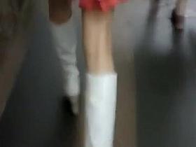 Sexy blonde in boots and a short skirt