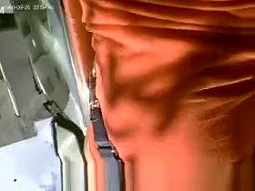 Upskirt in rolling stairs